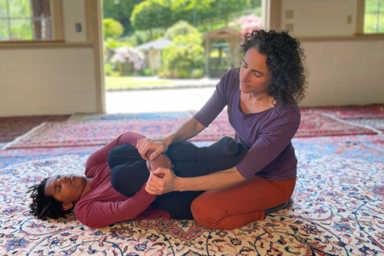 Alexandra Johnson practicing Breema bodywork. 